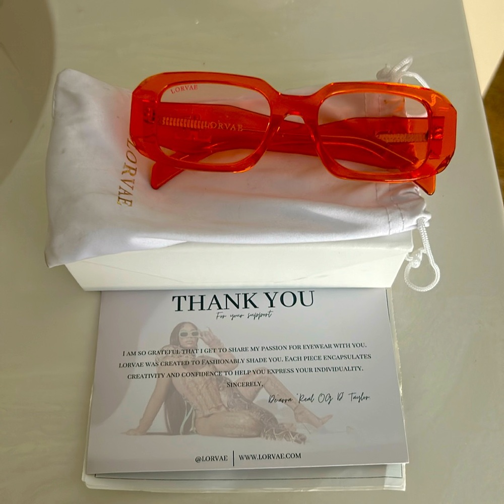 I’m currently selling Lorvae by Dearra “ Receipts” Orange Classes
